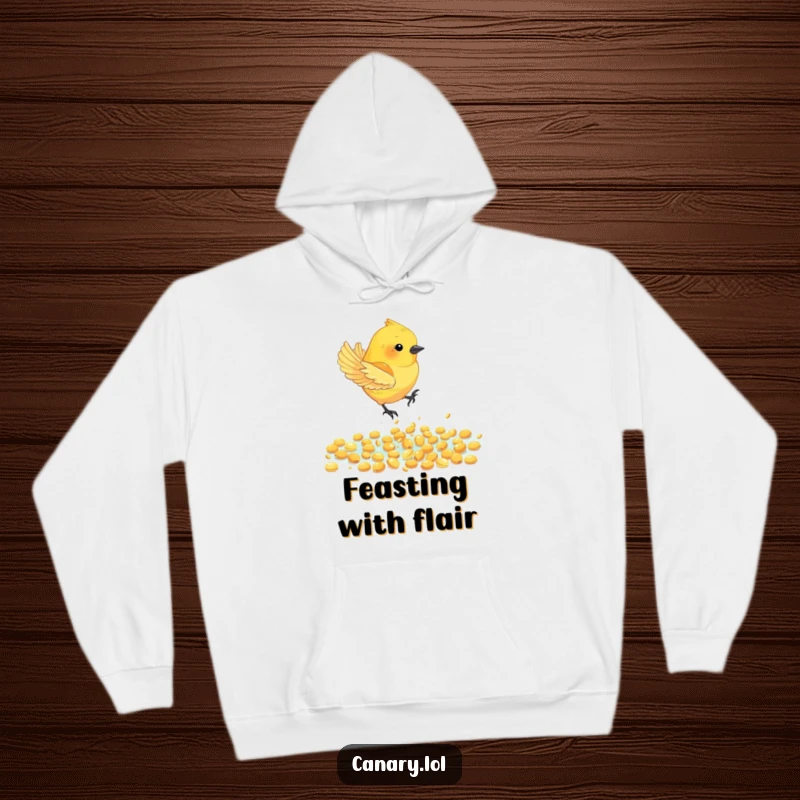 Funny Canary Bird Hoodie: A canary bird joyfully dives into a sparkling pool of golden seeds, radiating playful energy and humor.