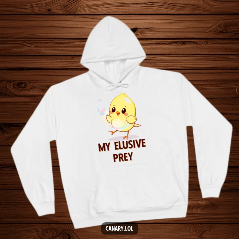 Funny Hoodie design of a yellow canary energetically chasing a large, shimmering iridescent bubble, capturing pure, playful motion.