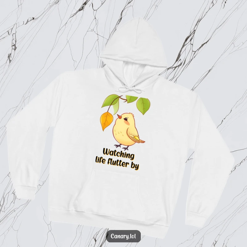 Funny Hoodie design of a yellow canary with a curious head tilt, observing a solitary red leaf falling in a peaceful autumn scene.
