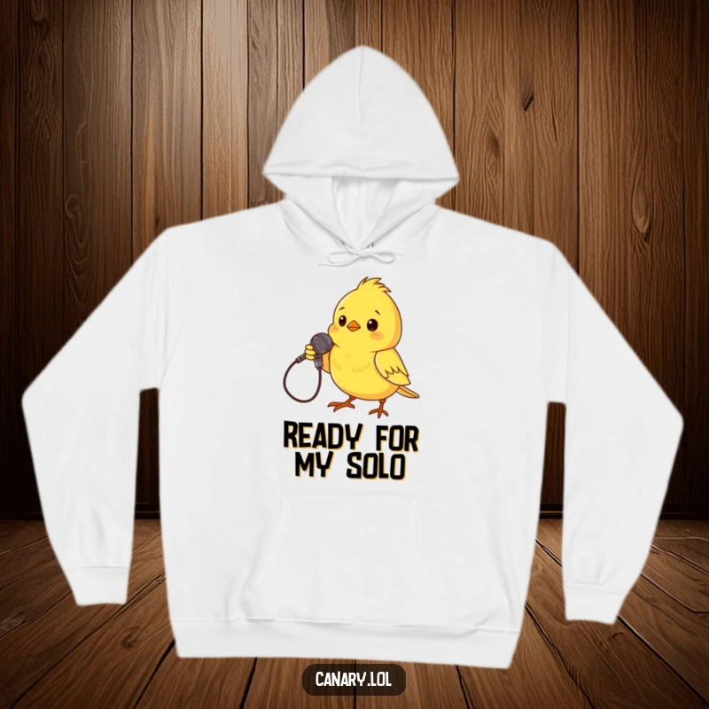 Funny Hoodie design of a small yellow canary dramatically posing with a twig microphone, ready to deliver a show-stopping performance.