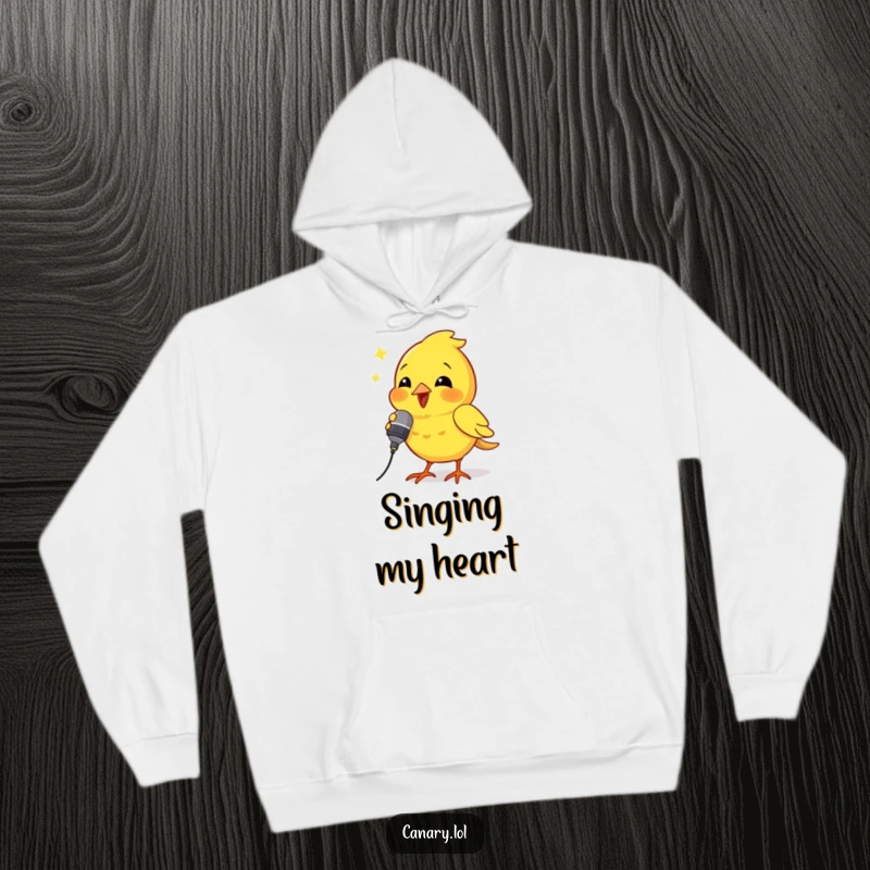 Funny hoodie showing a canary bird holding a tiny microphone and singing powerfully, radiating rockstar energy.